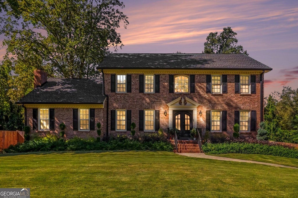 Photo of 6546 Rosecommon Drive NW, Peachtree Corners, GA 30092 (MLS # 10875211)
