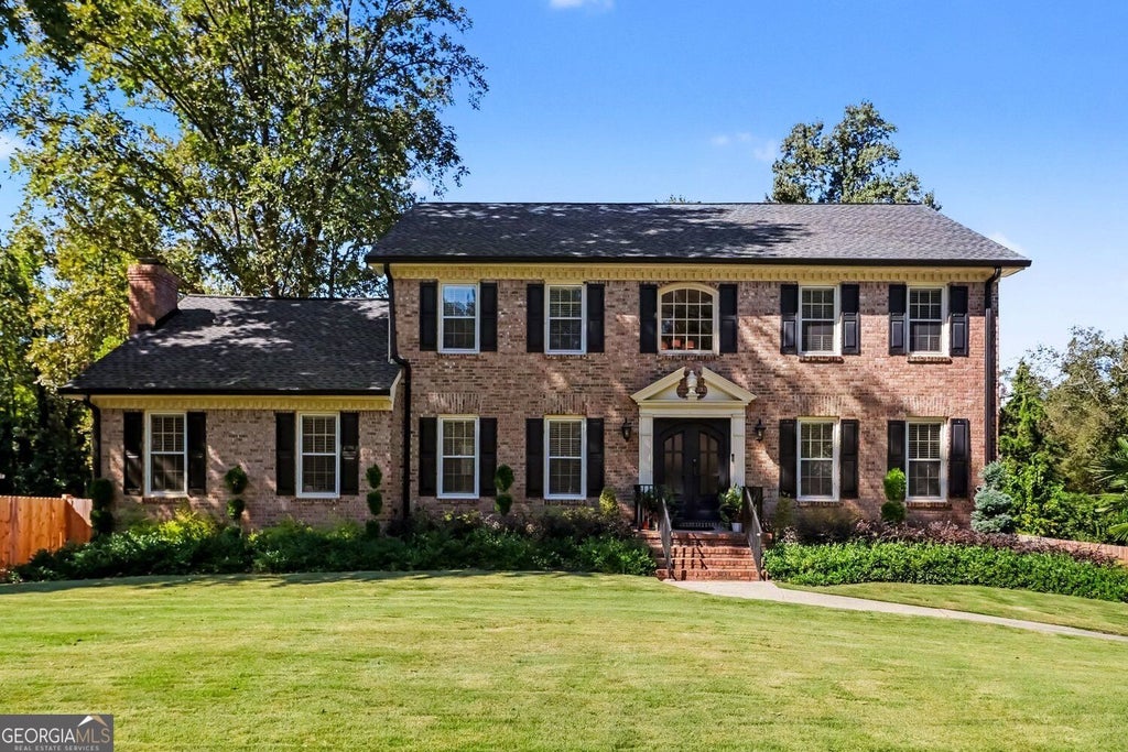 Photo of 6546 Rosecommon Drive NW, Peachtree Corners, GA 30092 (MLS # 10875211)