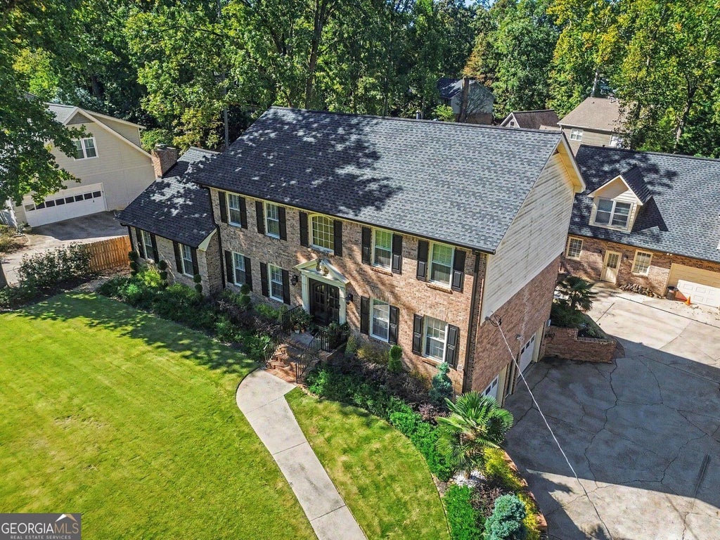 Photo of 6546 Rosecommon Drive NW, Peachtree Corners, GA 30092 (MLS # 10875211)