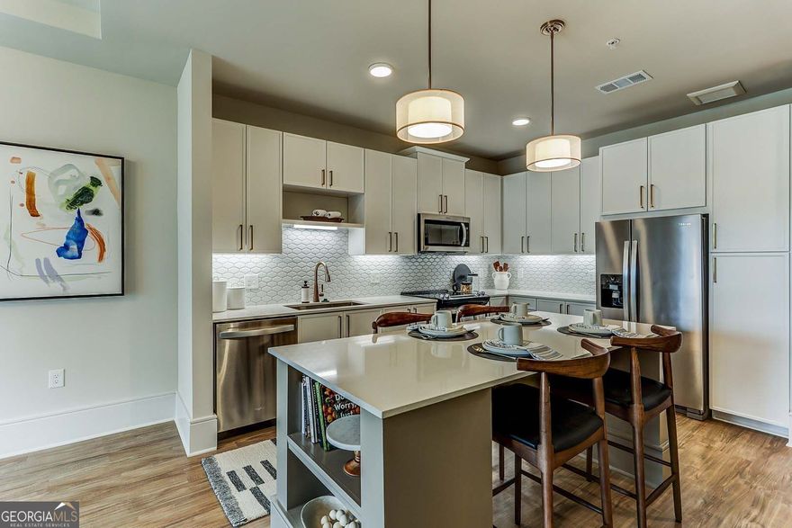 Professionally Designed Community Clubroom Featuring a Daily Breakfast Bar, Lounge, Co-Working Areas, Free WiFi Access, and a Reservable Conference Room. 9,000 SF Resort-Style Pool with Covered Cabana, Grill, Fireplace and Outdoor Dining Areas.