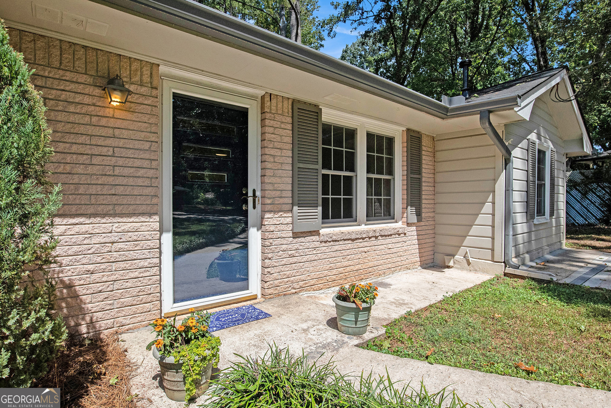 A Rare Jewel situated in a quiet, established Parkview neighborhood within walking distance to the Quaint Village of Downtown Lilburn. This adorable Classic Ranch-style home has been lovingly remodeled to create a fabulous comfortable living space featuring an open kitchen with a cozy breakfast nook, dining area and family room filled with natural light. The 3 spacious bedrooms are accented by the timeless warmth and beauty of the original hardwood floors. The large laundry room also provides ample storage space. Enjoy evenings on the back patio overlooking the large private backyard that provides endless opportunities for gardening, outdoor entertaining or future expansions. All this just a short distance to Downtown Lilburn where you can enjoy restaurants, shopping, a fabulous park with playground, walking/biking trails and year-round outdoor entertainment events. New roof, new electrical wiring, sought after Parkview schools and conveniently located for easy commuting...what more could you want!
