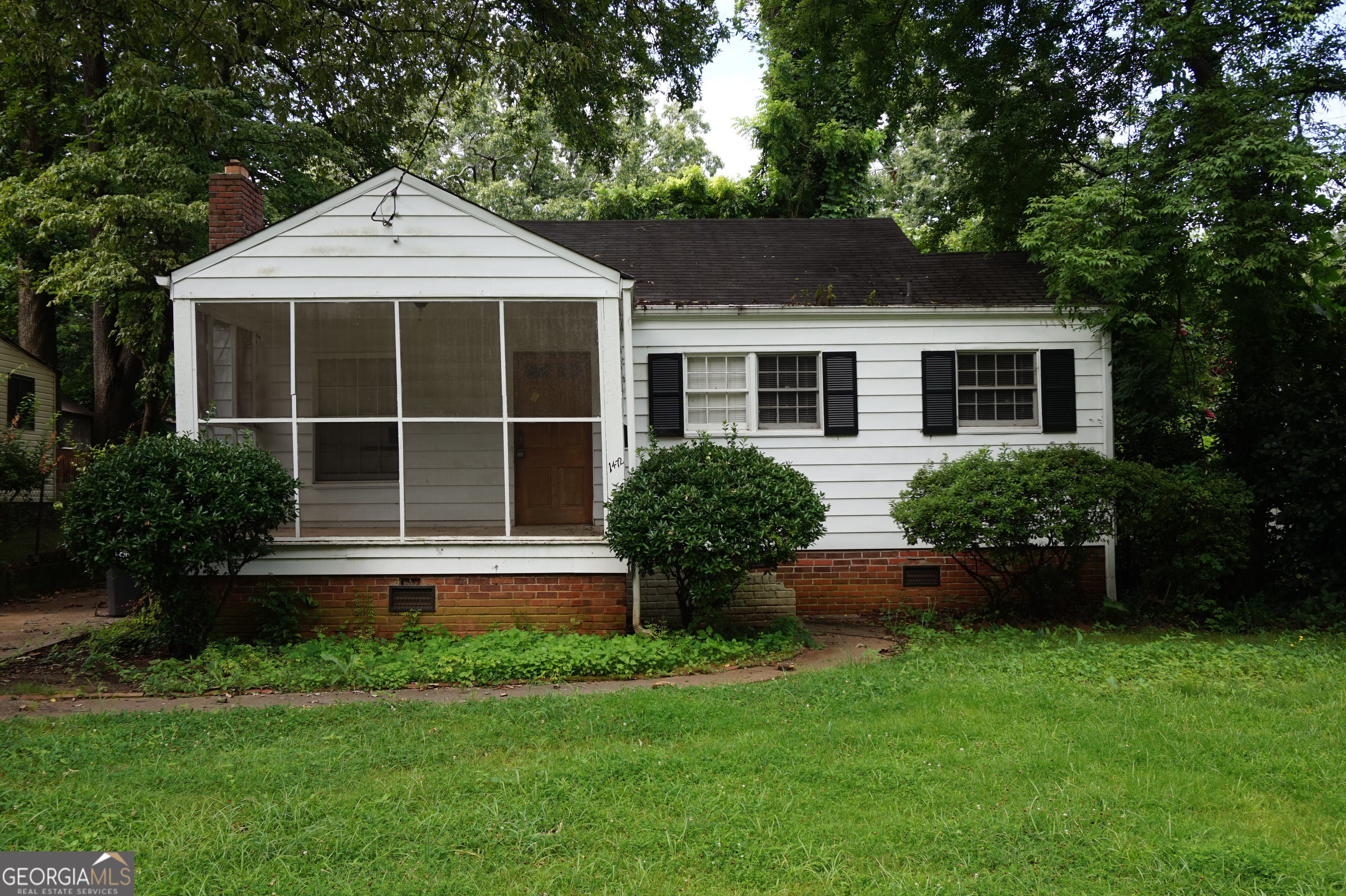 Opportunity Knocks in East Point! This classic 2-bedroom, 1-bath bungalow at 1472 Elizabeth Lane is brimming with potential for savvy investors or buyers ready to bring their vision to life. Whether you're looking to renovate and flip, add to a rental portfolio, or transform a charming fixer-upper into your forever home, this property is your blank canvas. Investor Special - Sold As-Is Owned by an investor and priced accordingly, this property is being offered AS IS - no disclosures, no repairs - just possibilities. The bones are here, and the location does the heavy lifting. A little creativity and effort could turn this into a cash-flowing rental, a profitable resale, or a thoughtfully customized personal home. Solid Layout & Classic Charm The home features a cozy living space, original hardwood floors (ready to be refinished), and a traditional bungalow layout with two bedrooms and one full bath. A deep backyard offers room for expansion, outdoor living, or creative landscaping. The quaint screened front porch and classic exterior provide the curb appeal today's buyers and renters love. Prime Location Near It All Nestled in a growing East Point neighborhood, you're just minutes from MARTA, and less than 15 minutes to the heart of downtown Atlanta. Even better, you're near one of Atlanta's most exciting redevelopment corridors - the Lee + White district in the West End. This vibrant mixed-use destination features breweries, artisan food manufacturers, restaurants, a modern food hall, boutique retailers, and creative workspaces - all anchored by the buzzing "Great Lawn," a central space for events, community gatherings, and weekend fun. Why You'll Love This Property: Excellent price point with upside potential Quick access to transit and major interstates Minutes from the BeltLine and Lee + White development Quiet street with long-term homeowners and strong community feel Ideal for investors, flippers, or first-time buyers with a vision Bring your contractor and your imagination - this one is ready for its next chapter. Properties with this kind of potential, in a location this hot, don't stay on the market long. Vacant. Use ShowingTime to schedule tour. Cash or conventional offers preferred. Don't miss your chance to unlock the value at 1472 Elizabeth Lane - East Point is on the rise, and this is your chance to rise with it.