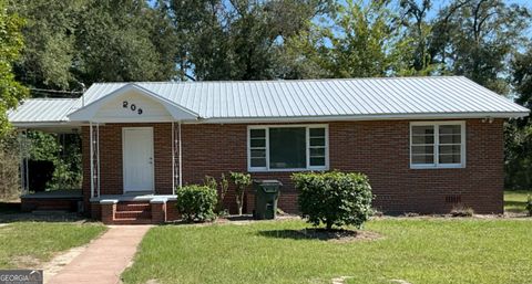 Photo of 209 Price Street, Swainsboro, GA 30401 (MLS # 10649918)