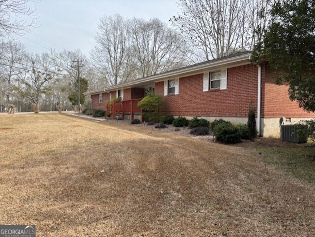 Photo of 2215 Oak Hill Rd, Covington, GA 30016 (MLS # 10762105)