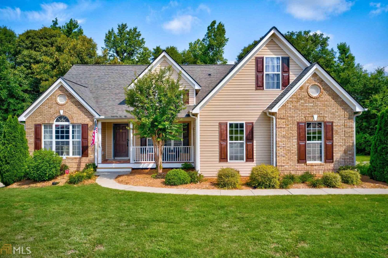 Exceptional ranch home on almost 1 acre lot is less than 1.5 miles from I85! Updated interior features large open rooms and a flowing floorplan with handscraped hardwood LVT floors, beautiful lighting, and high ceilings. This home is perfect for entertaining family & friends with plenty of space for all. Kitchen has an abundance of cabinets and counterspace, new stainless steel appliances, a large breakfast bar and it overlooks the breakfast area and fireside family room. There are 2 Master Suites - one on the main level and one on the terrace level. Both are tranquil spaces with spa like baths!Spacious secondary bedrooms are on main with a bonus room upstairs. Finished flex rooms +unfinished storage in basement. The deck was rebuilt in the last 3 years and leads from the family room down to the backyard with planting area, seating, and your above ground pool. The basement was finished in the past two years with brand new HVAC. Septic has been serviced and inspected May 2020. HVAC has been zoned upstairs for each room and each has its own thermostat and the roof is only two years old. This home is move in ready!!