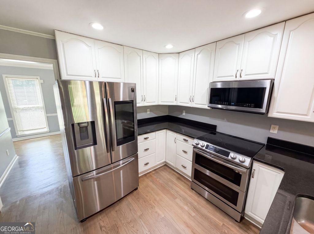 Photo of 1876 Geyser Trace, Lawrenceville, GA 30044 (MLS # 10772135)