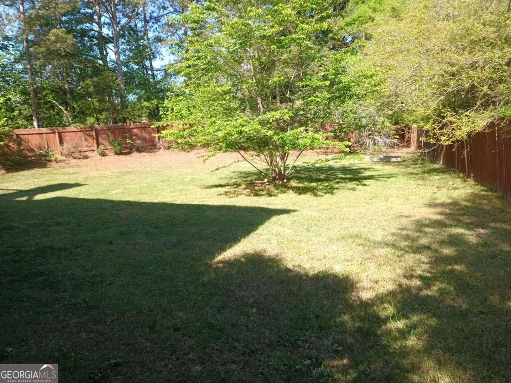 Photo of 9359 Windchase Way, Jonesboro, GA 30238 (MLS # 10733332)