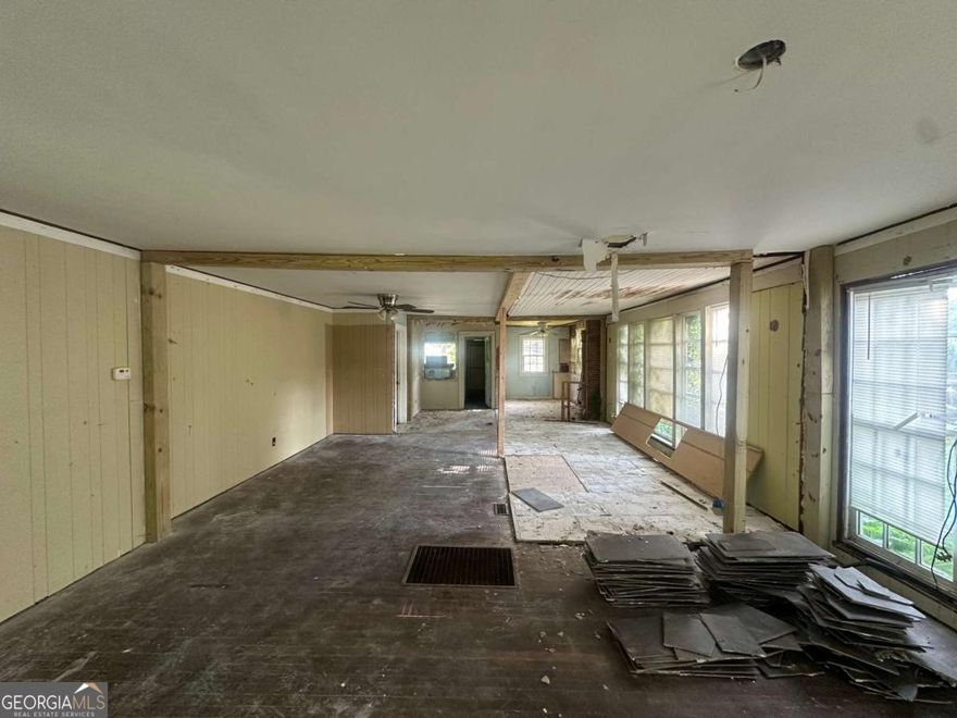 Your Oakland City Opportunity Awaits! Priced to Sell - Embrace the Potential (As-Is). Are you looking for a property with immense potential in a fantastic location? Look no further! This Oakland City home offers a blank canvas for your vision, whether it's a stunning renovation, a high-demand rental (freedom from restrictions!), or a personalized residence. Enjoy unparalleled access to the outdoors with Bush Mountain Outdoor Activity Center right across the street. Imagine weekend strolls on the Beltline, just a short walk away! Plus, the convenience of being minutes from the AUC Center, Wild Heaven West End Brewery & Gardens, and Monday Night Garage adds to the appeal. Being sold AS-IS, the attractive price reflects the opportunity for you to customize and profit. Don't let this prime location and incredible value pass you by!