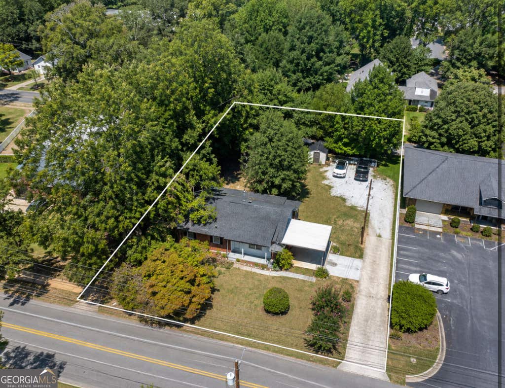 Photo of 600 E Lanier Avenue W, Fayetteville, GA 30214 (MLS # 10832864)