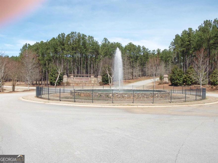 Affordable, level, wooded homesite in peaceful, private corner of Providence Ferry with Lake access. Underground utilities, paved roads with streetlights and neighborhood family pavilion. 1800 square feet minimum to build (no mobiles or RV's). 8 miles to Lincolnton, easy drive to Athens or Augusta. Community offers 156 acres of common land with abundant wildlife, great fishing, trails, greenspace, and boat storage. Buy land now and plan your perfect summer getaway or retirement home.
