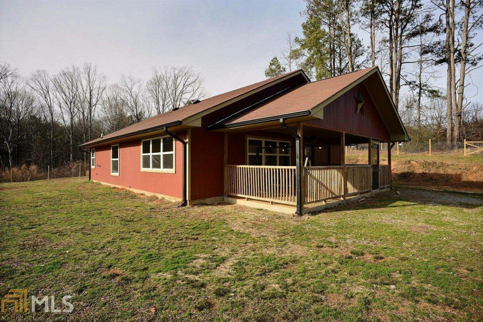 Simplistic living, wheelchair accessible, one level, secluded, & in the mountains - definitely a person’s dream home or home away from home. Brand new vinyl floors give it the “in-style” farmhouse feeling. A very open floor plan including the updated kitchen with pantry & room to put an island for extra storage/counter space if need be, the living room with a clean slate to make it feel like home, & space for a dining area of your choice! 3 spacious BR/closets in each, plus double vanities in both BA. Outdoor enthusiast? Located in a pasture on 3.84 acres of endless possibilities! Woods line the property as well as a fence & stream that make it a perfect spot for a hobby farm - maybe those horses you have been wanting for so long can experience the mountain life with you! Or maybe just a gardening spot or a wide open space for the imaginations of kids to run free. Workshop wired for electrical and AC are a plus! It can all begin here in the mountains!
