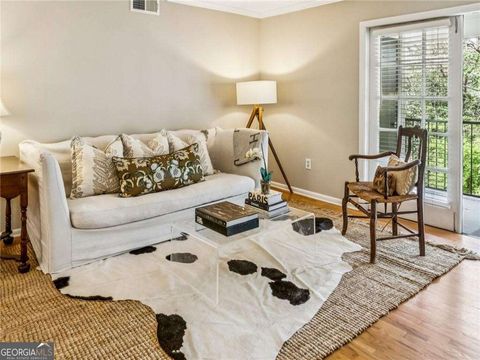 Photo of 1150 Collier Road NW #J11, Atlanta, GA 30318 (MLS # 10720807)