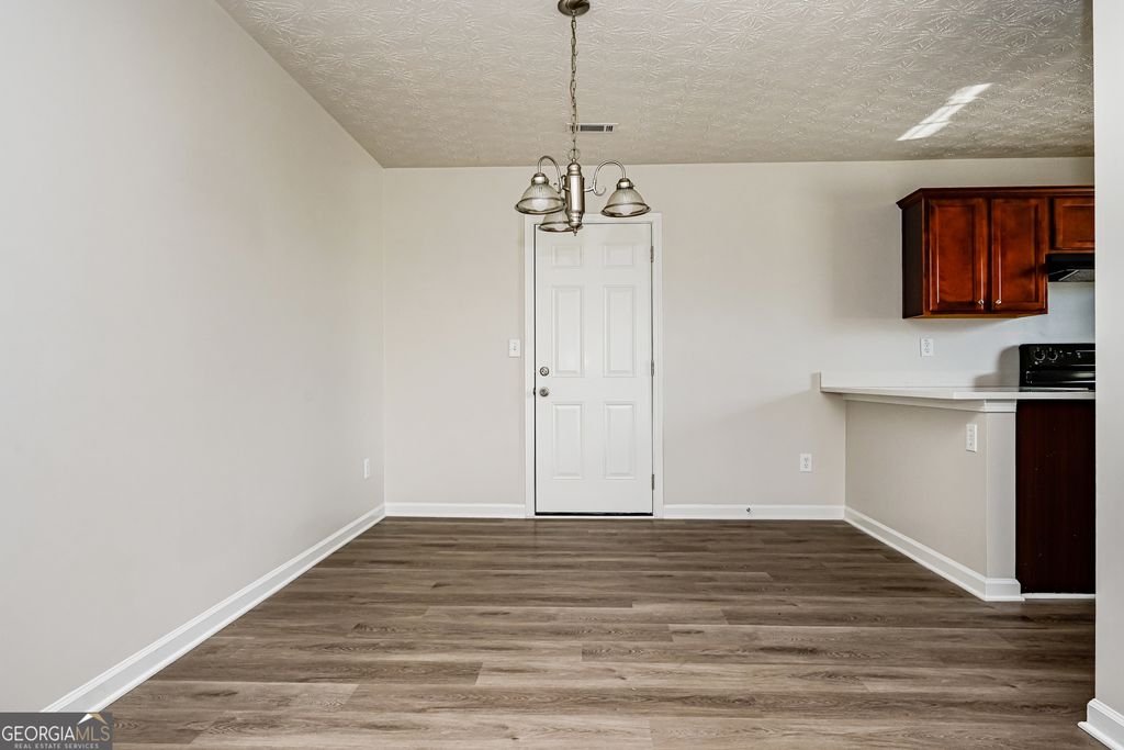 Photo of 6864 Amethyst Avenue, Rex, GA 30273 (MLS # 10676360)