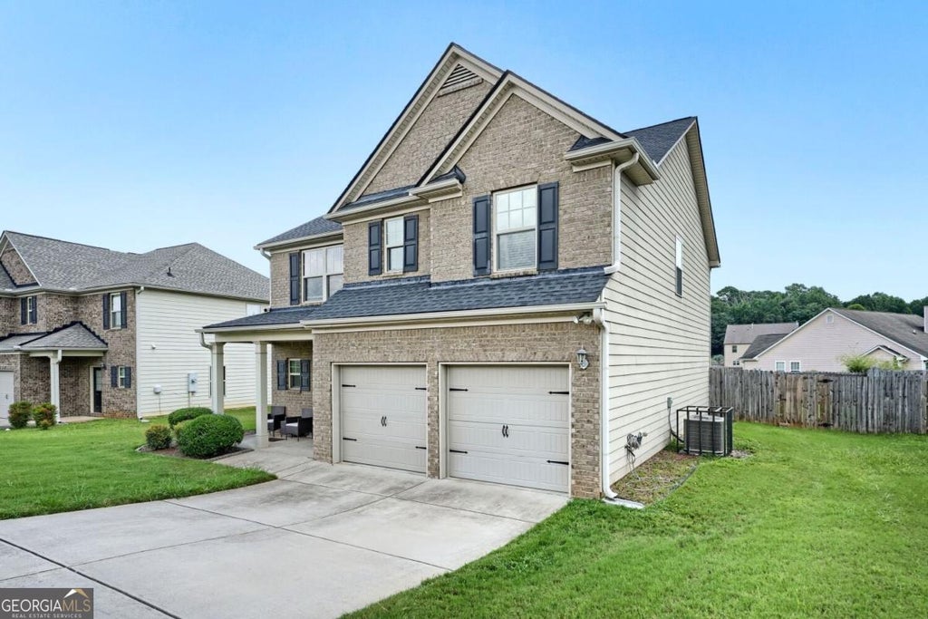 Photo of 5830 Rex Ridge Parkway, Rex, GA 30273 (MLS # 10828571)