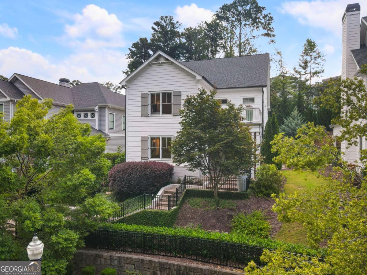 This is the lifestyle you've been waiting for! Nestled between Keswick Park, local restaurants, and scenic community trails, this STUNNING home blends elegance, comfort, and convenience. Step inside to warm oak hardwood floors that guide you into the spacious family room, seamlessly connected to the dining area and gorgeous kitchen - creating the perfect environment for entertaining. The main level features: A dedicated office with custom built-ins and glass French doors A spacious powder room An inviting guest suite complete with ensuite bath and walk-in closet Love the outdoors? Relax on the covered rear porch with an infrared heater, or gather with friends in the open-air courtyard around the massive gas firepit. Your pets will love the artificial turf backyard, and you'll love the low-maintenance upkeep. Upstairs, the oversized primary suite offers true privacy with his-and-hers closets, a morning kitchen for your daily coffee, and a luxurious bathroom featuring gorgeous herringbone marble flooring. The best surprise of all? A 400 sq ft carpeted, conditioned flex space just off the bathroom - ideal for a home gym, hobby room, or generous storage. This one-of-a-kind home is filled with thoughtful upgrades designed to enhance your daily lifestyle. Don't miss your chance - schedule your showing today!