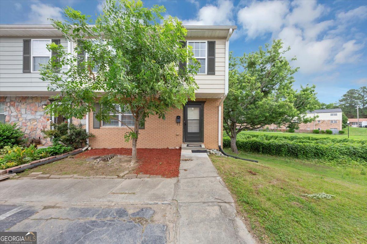 Welcome to 4701 Flat Shoals Road, Unit 37H - a beautifully updated end-unit townhome located in a quiet, well-maintained community in Union City. This spacious 3-bedroom, 2.5-bath home features a fully finished basement, offering plenty of additional living space perfect for a home office, media room, or guest area. Enjoy the privacy of your own fenced-in patio, ideal for outdoor relaxation or entertaining. Inside, the home boasts fresh paint, new flooring, and a newer HVAC system, making it move-in ready and exceptionally clean. The community offers great amenities, including a nearby playground, and is just minutes from I-85 and Hartsfield-Jackson Atlanta International Airport. With dining, shopping, and everyday conveniences less than five minutes away, this townhome combines comfort, style, and unbeatable location.