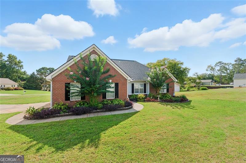 No HOA. Beautiful 3 bedroom/ 2-bathroom, 2 car garage home on almost a full acre with bonus room and detached 2 Car high ceiling garage/workshop. Kitchen remodeled in 2015. All appliances as well as washer dryer come with home. Ceiling fans in bedrooms and 2 on back patio. All light switches are smart switches. Master opens out onto back patio. Master bathroom has his and her sinks, large tub, and separate shower. Detached garage/workshop has full electricity and ceiling vent fan. Home bonus room could be used for office and extra-large attic space could be converted. Home has covered patio for grill or smoker, and potential pool. Room for garden also. New HVAC!! Roof replaced 2017, and hot water heater replaced 2019. Will sell fast, come see, and send offers asap!