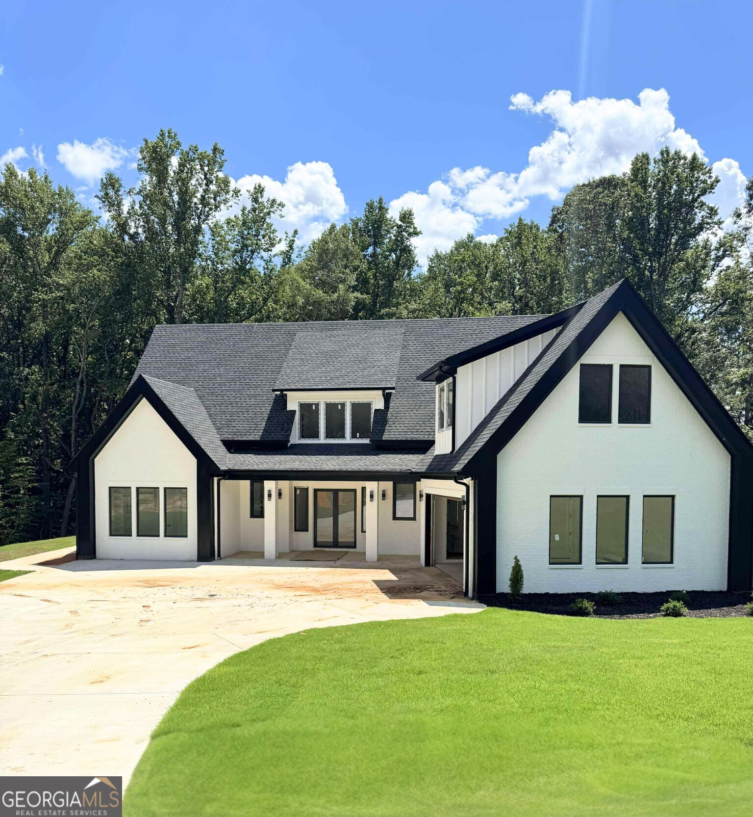 Welcome to Luxury Living in Auburn, Georgia! Step into elegance with this stunning brand-new construction in one of Auburn's most beautiful and fast-growing communities. This 4-bedroom, 4.5-bathroom luxury home offers the perfect blend of sophistication, comfort, and convenience-all situated on a solid slab foundation for lasting quality. Designed with today's lifestyle in mind, the home features a wide open-concept floor plan that flows seamlessly from the chef-inspired kitchen into the spacious living and dining areas-ideal for both entertaining and everyday living. Enjoy the rare luxury of an expansive primary suite on the main level-complete with a walk-in closet-perfect for multigenerational living or everyday convenience. Each bedroom is generously sized, featuring its own private bath and a walk-in closet, ensuring comfort, privacy, and ample storage for every family member or guest. Modern finishes, designer touches, and thoughtful details are found throughout, creating an atmosphere of true luxury. Nestled in a picturesque new community, this home delivers both style and serenity in a prime Auburn location.