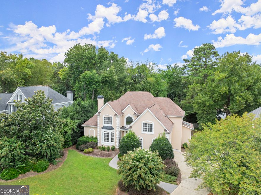 An East Cobb GEM! One of the largest homes to hit the market in this area. This beautiful home features amazing upgrades throughout the home. This home features an amazing 2 story foyer and a sprawling slightly spiraled staircase leading up to the 3 large bedrooms upstairs. Each bedroom upstairs has its own full bathroom and spacious closet space. The Master bedroom is on the main level, the only bedroom on the main level, that features a soaking tub, a large separate shower, and a custom closet perfect for a couple.  The main level has marble floors at the entrance, and hardwood throughout the main level. The bedrooms upstairs have carpet that has been replaced in 2024.   The basement is finished and is an additional 2500 sqft of living space that features 2 additional bedrooms, a full bathroom, a great room, an office, a Kitchen, dining room, storage, and more!  As stated before, this is an East Cobb Gem. This is a quiet, well-established, and sought-after neighborhood. Perfect for a large family or a growing one, Sulky has all you could dream of.