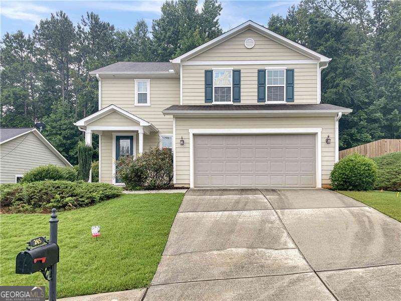 Terrific 3BR / 2.5BA Woodstock home in popular Wynchase subdiv with Swim/Tennis. Main lvl w/hdwd flrs throughout. Open plan w/large Family Rm that is open to Dining Area and Kitchen. Separate built-in planning desk / buffet counter, Kitchen w/Bkfst Bar, Island, SS appliances, Granite and lots of cabinets / counters. Pantry closet and 2-Car Garage access off the Kitchen. Upstairs hallway w/lg built in desk / work area. Master BR / Master BA w/lg walk-in closet, dbl vanities, sep shwr and garden tub. Walk-in Laundry Rm, Hall BA and 2 Guest BR's upstairs too. Covered rear patio and level rear yard.