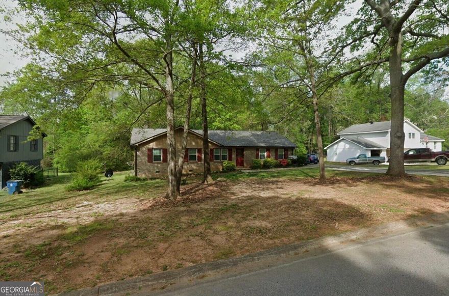 Charming Home in McDonough! Welcome to 165 Wellington Dr, a spacious 4-bedroom, 2-bathroom home boasting an open floor plan perfect for modern living. Featuring beautiful hardwood floors, abundant cabinet space, and a generous pantry, this home is full of potential! Enjoy the convenience of being just minutes from the vibrant McDonough Square, with plenty of shopping, dining, and entertainment options nearby. Located off Lake Dow Road, this property is a must-see! Don't miss out on this fantastic opportunity!