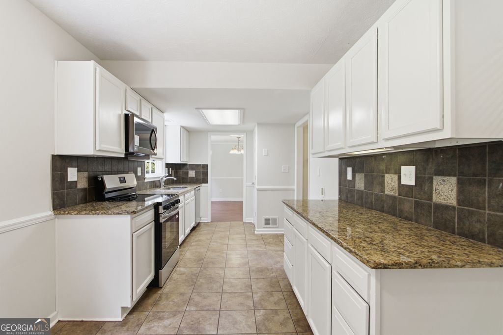 Photo of 310 Derby Drive, Fayetteville, GA 30215 (MLS # 10768710)