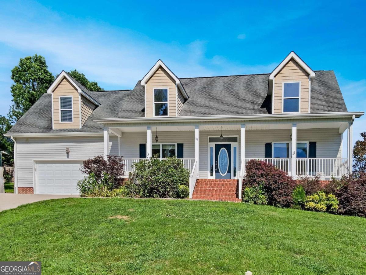 Beautiful 4-bedroom home in Stanford Place! This cape-cod style home has great curb appeal and a lovely covered front porch. It has a 2-car garage facing the front and also an additional boat or motorcycle garage at the terrace level! Inside has gorgeous wood floors and a cozy fireplace in the living room, a separate dining room, and a great kitchen with timeless white cabinets and stainless steel appliances. The master bedroom is on the main level. There are 3 more bedrooms on the upper level plus a full bathroom. This home has a partially finished basement providing additional living space for a playroom, office, or family room! The basement has a full bathroom so it would even make a great guest space! This home has a deck in the back and a fenced backyard. This is a great home and a nice neighborhood.