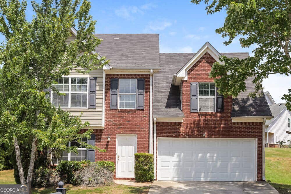 Photo of 832 Freedom Walk, Locust Grove, GA 30248 (MLS # 10833387)