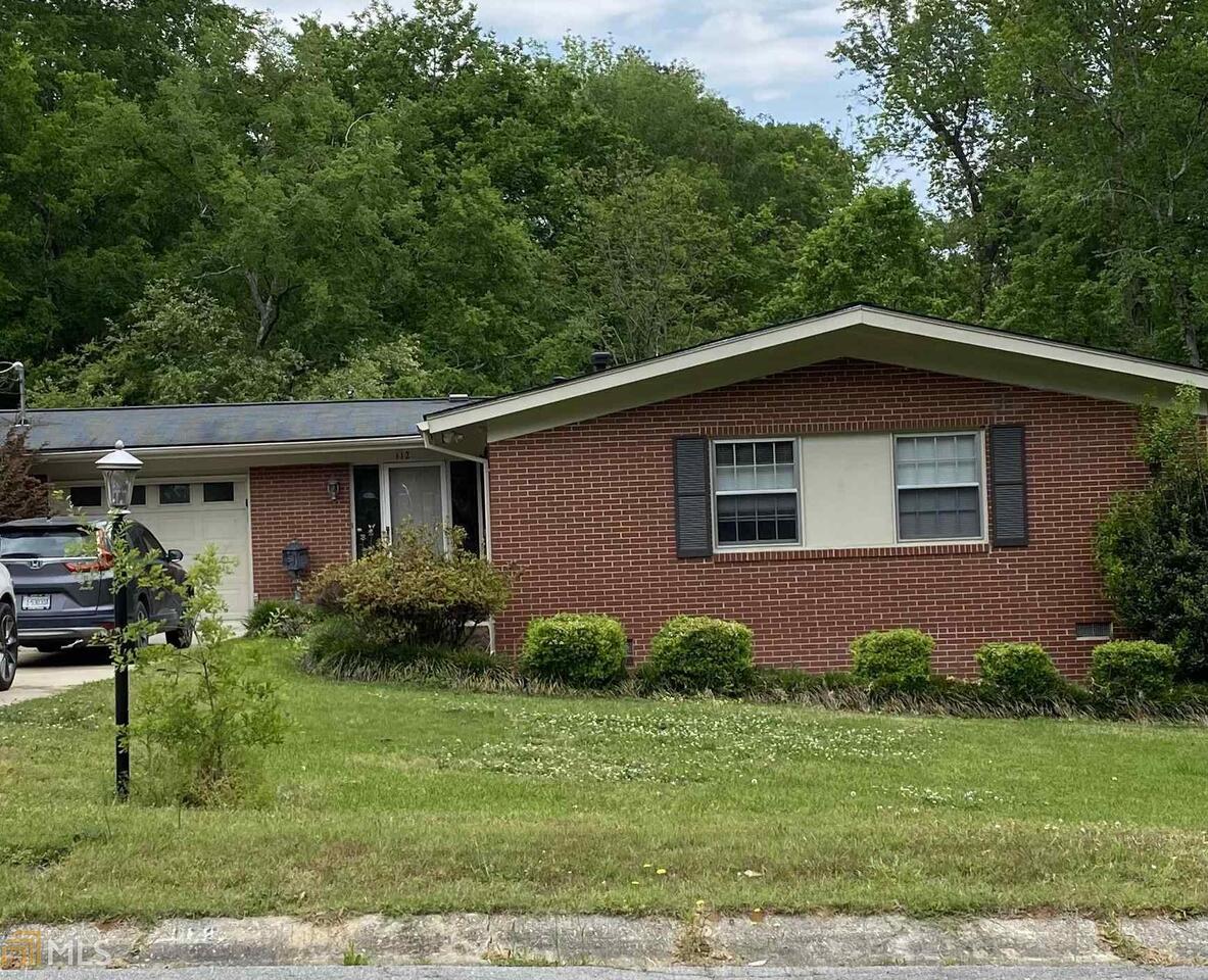 College Student Home Away from Home! This adorable 3 bedroom 2 bath home is less than a mile from Georgia College's West Campus. Great sunroom to hang out on beautiful days and completely remodeled bathroom. Hardwood floors throughout, security system and all appliances stay. Even the washer and dryer. MOVE IN READY! Agent On