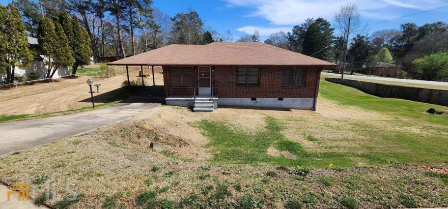 Investor's Special!!! Charming 4 sided brick home. 3 bedrooms, 1 bath with hardwood floors throughout. With a little TLC this would be the PERFECT 1st family home or small business! This is definitely a diamond in the rough as it sits on a .5 acre corner lot near LOTS of shopping, dining, and Cobb County Schools! This is a must see, it won't last long!