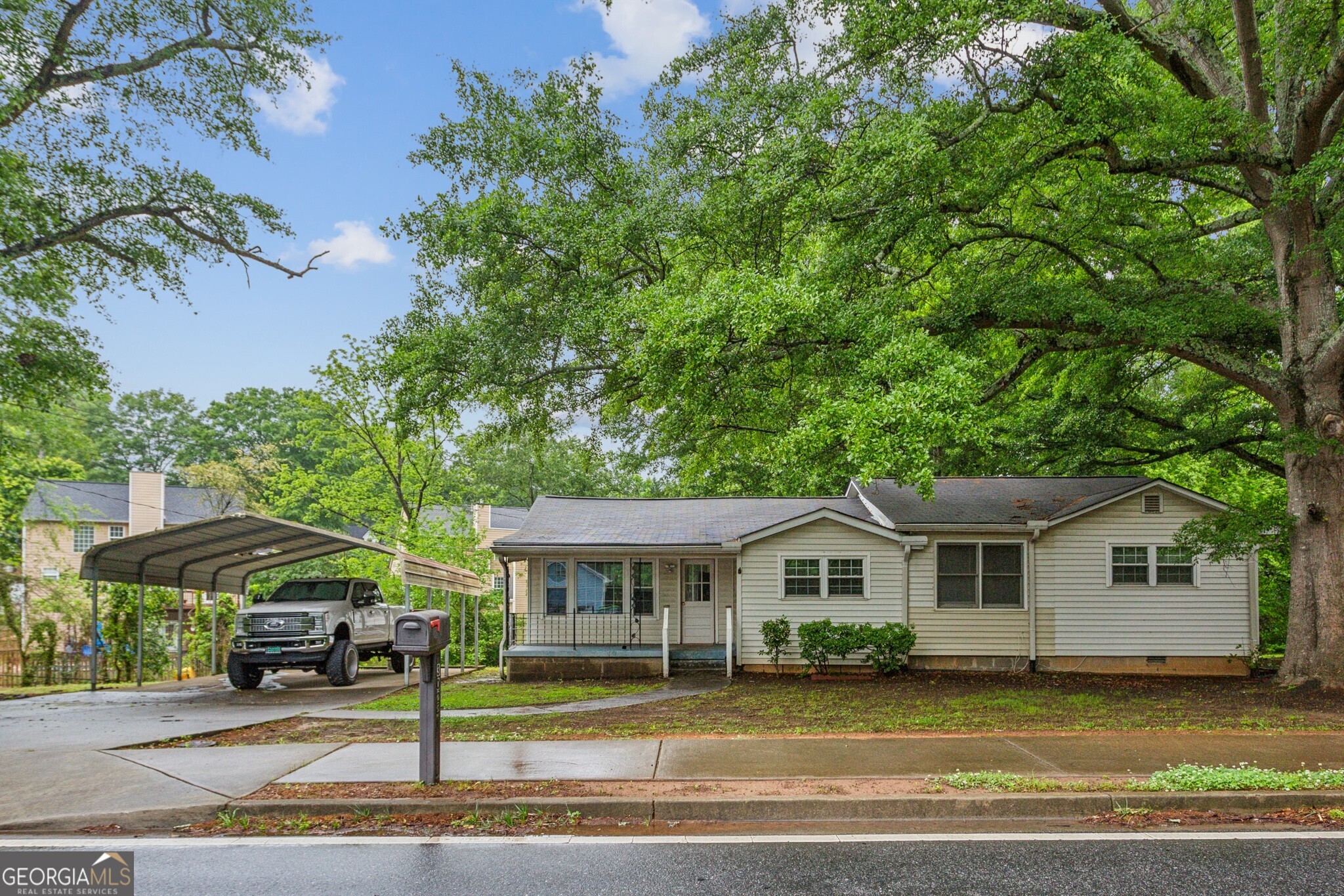 Ranch Home on a 1.2 Acre Lot! Located in Sought-After Marietta, this home is situated near Marietta Square, Downtown Kennesaw, Kennesaw Mountain State Park, and more. Perfect for a Savvy Buyer or Investor, this home presents a wealth of Potential and Opportunity for Updating or Rebuilding! Upon Entering, you'll find a flowing floorplan that seamlessly connects the Family Room and Kitchen. An adjacent Sunroom leads way onto the Back Porch, a perfect layout for indoor-outdoor entertaining. With Three Bedrooms and One Bathroom, there's plenty of space for everyone. Outside, you'll discover a Large, Flat Backyard providing plenty of room for Pets, Play, Gardening, or Expansion plans. Minutes to Shopping, Dining, and Entertainment with Easy Highway Access!