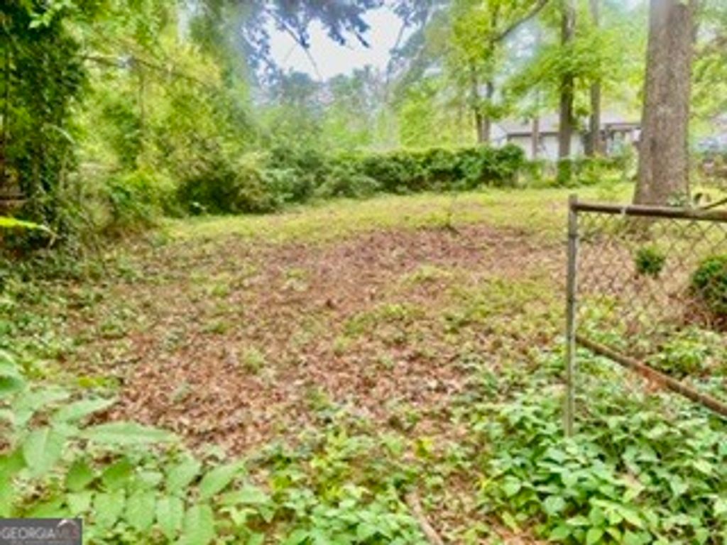 Photo of 562 Roxbury Drive, Riverdale, GA 30274 (MLS # 10813747)