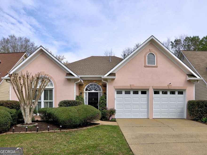 Charming 3-bedroom 2 bath home with many updates, move-in ready!  Easy main-level living in this spacious and open floorplan.  Beautiful foyer open to inviting and large den with brick fireplace with gas logs. The beautifully updated kitchen features new countertops, new backsplash, new sink, new paint, new light fixtures, stainless appliances and breakfast bar. A separate breakfast area is bright and sunny with a wall of windows. The separate laundry room includes a laundry sink and tons of storage. The beautiful dining room is light and open and features a new light fixture; it could be used as a spacious office. The inviting over-sized primary bedroom has new carpet and is very private.  The primary bath features double vanities, a separate walk-in shower, soaking tub and large walk-in closet. Two secondary bedrooms are perfect as guest rooms or office space or craft room.  The amazing back yard has a new fence, huge over-sized deck, recently stained, and beautiful landscaping. This private and tranquil area is perfect for morning coffee or entertaining guests. This home has been meticulously maintained and is move-in ready!  It includes new HVAC, new hot water heater, new toilets, new carpet, new light fixtures, new garage doors, new fence, new paint, new sink, new countertops and new backsplash. Located in a sought-after swim/tennis neighborhood which also includes a clubhouse and nature trails for walking and hiking   Convenient to schools and shopping with easy access to major highways. A really gorgeous home, move-in ready!