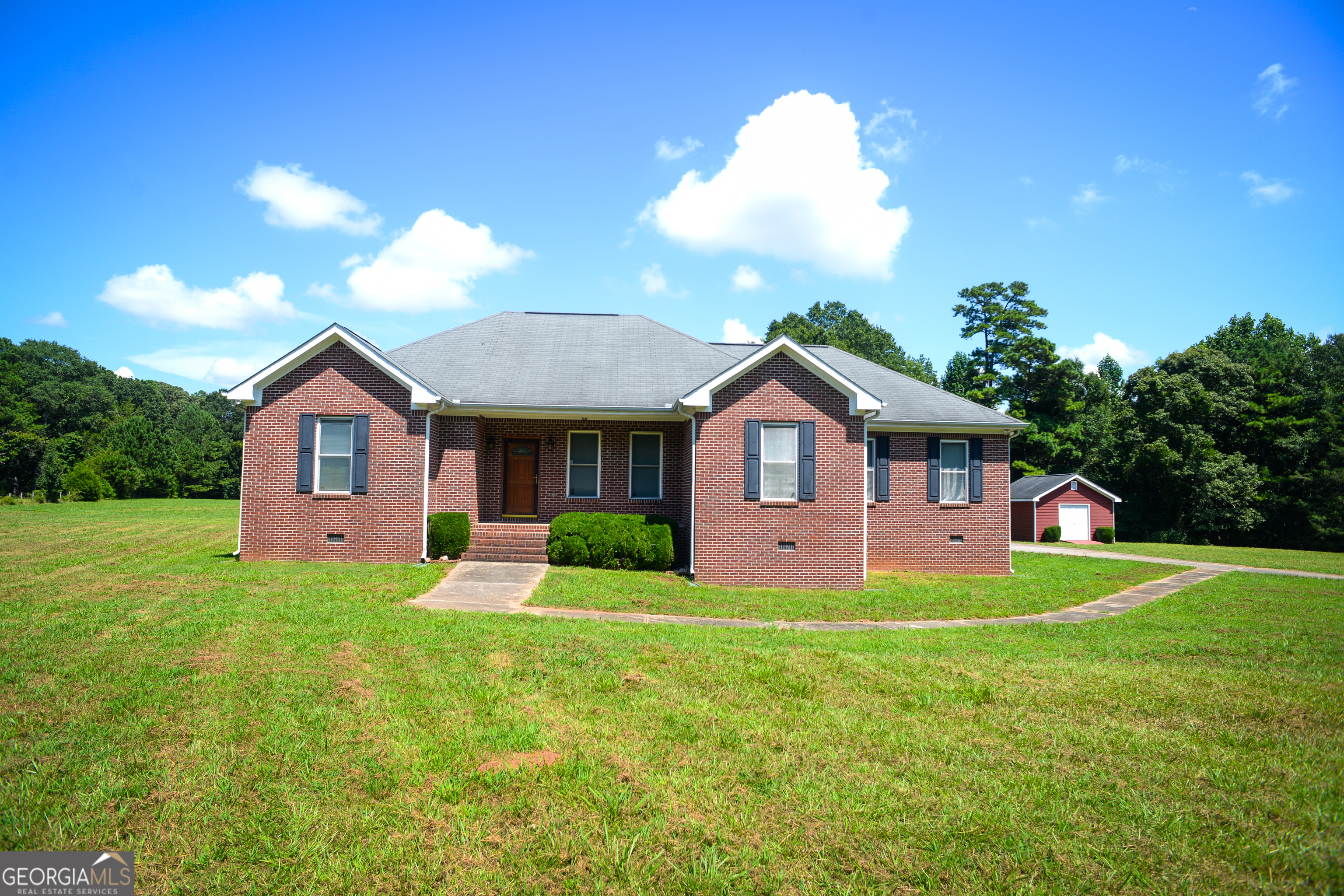 *2 ACRES!!* Welcome to this charming 3-bedroom, 2-bathroom brick ranch in desirable Stockbridge! This well-maintained home offers a perfect blend of comfort and convenience. Enjoy the durability and classic appeal of a 4-sided brick exterior. Inside, find a spacious living area, a functional kitchen, and a serene backyard. The master suite provides a private retreat. Located in a sought-after neighborhood, you'll be close to shopping, dining, and parks. With its solid construction and inviting atmosphere, this home is ready for you to create lasting memories. Don't miss this opportunity - schedule your showing today!