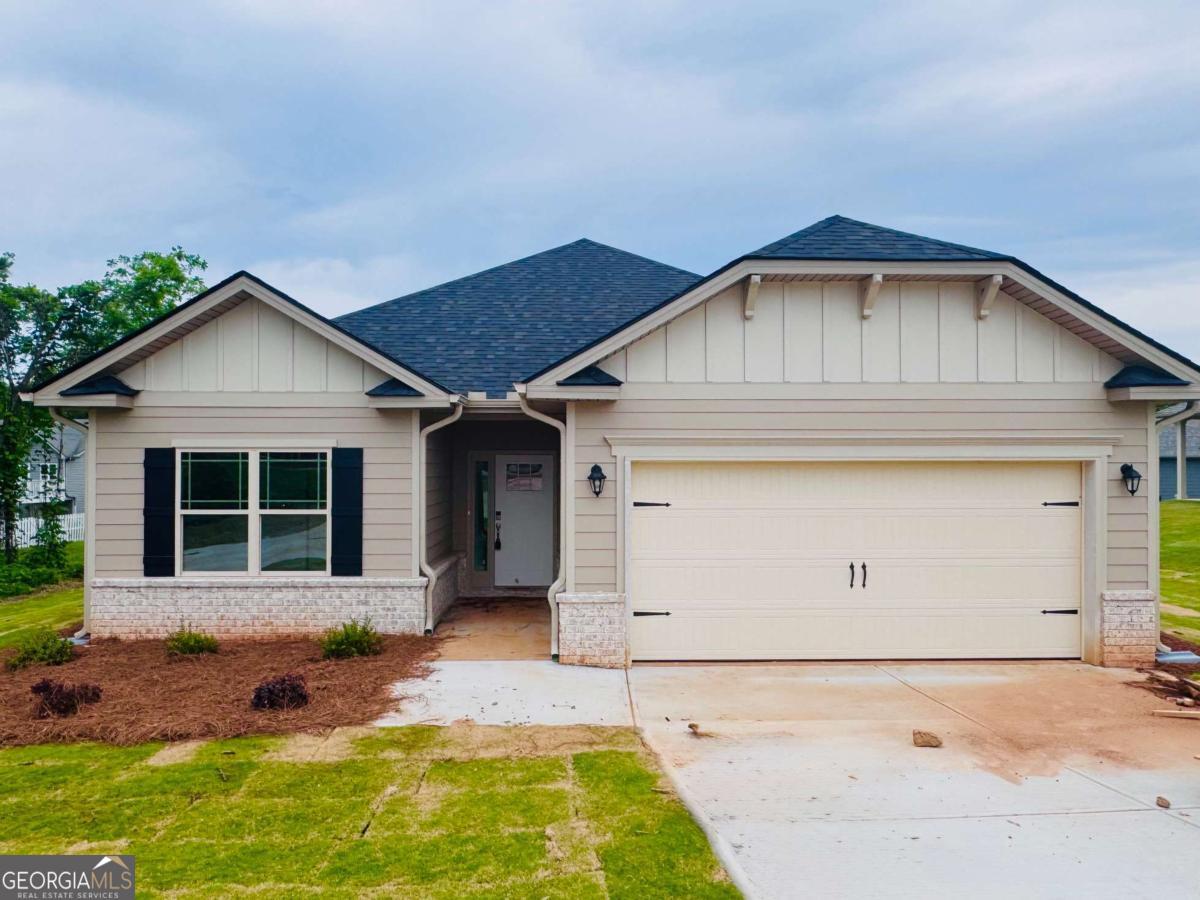 Buying as new home is a piece of cake, especially with a sweet deal like this! Private lot Ranch Home with ALL appliances included. Brand-new Stainless-Steel Refrigerator, Stove, Microwave, Dishwasher, Garbage Disposal, Washer, Dryer, and Automatic Garage Door Opener with Wifi! This home is 100% complete and move-in ready. NEW CONSTRUCTION RANCH STYLE HOME IN HABERSHAM COUNTY'S #1 NEW HOME SALES COMMUNITY BY A MULI-AWARD WINNING FAMILY-OWNED BUILDER! ONLY $1000 EARNEST MONEY FOR PRIMARY RESIDENCE (10K EM FOR INVESTORS). SELLERS CONTRIBUTION AVAILABLE TOWARD CLOSING COSTS W/PREFERRED LENDER ONLY. Welcome to 831 West Airport Road (LOT 03), located in the Southern Appalachian Foothills of North Georgia. Enjoy all the luxuries of the Southern Charm, from farm to table dining, wineries and some of the best outdoor adventures in the tri-state area of GA, NC & SC!!! 1 Yr. Builder's Warranty, 2 Yr. Systems Warranty, 10 Yr. Structural Warranty, 2 Pre-Closing Walk Throughs & a Smart Home Package. This 1634 ranch plan boast sleek grey hardwood cabinetry w/ crown molding & brushed nickel bar pull hardware, dining area, spacious kitchen island overlooking vaulted ceiling living area, with upgraded granite countertops, partial brick front, owner's ensuite large stainless steel shower w/ glass door. Upgraded LVP flooring in family room, baths & laundry rm. Ceiling Fan w/ light kit added to Covered back lanai, sprinkler system with an amazing lawn.