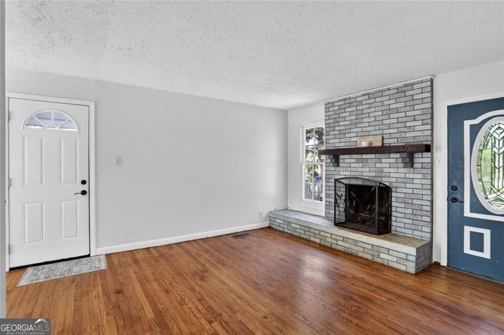 Photo of 2407 Woodland Drive, Kennesaw, GA 30152 (MLS # 10724806)