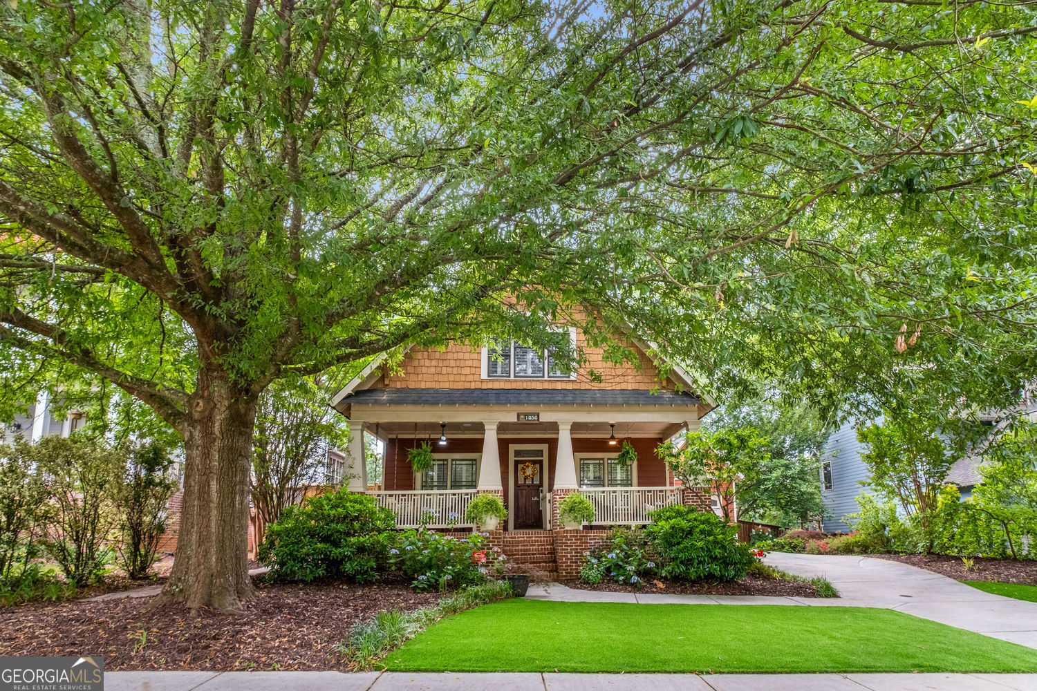 Welcome to 1856 Timberwood Trace, a pristine Craftsman tucked into a quiet cul-de-sac in the coveted Preston Place community. From the rocking chair front porch to the double-decked backyard oasis, this home delivers the perfect blend of charm, space, and low-maintenance living. Inside, hardwood floors flow through an open main level with a spacious living room anchored by a gas fireplace. The versatile front bedroom works as a home office or guest space, while the bright kitchen is built for entertaining. Another bedroom with ensuite bath and walk-in closet completes the main floor. Upstairs, the oversized primary suite is a true retreat with a spa-like bath, soaking tub, dual shower heads, and generous walk-in closet. A third bedroom and full laundry room round out the upstairs. Outside? Let's talk showstopper. Turf front and side yards (mini putting green included), double decks, a brick fireplace with gas starter, and a newly added custom-built grill area create the ultimate outdoor living experience. To top it all off, the home is part of a well-managed and low-key HOA at just $200 per year, with no rental restrictions-making it ideal for both homeowners and investors. Located minutes from East Lake, East Atlanta Village, 2nd & Hosea, Oakhurst, and Decatur, this home is turn-key and totally unforgettable. Schedule your showing today before it's gone again.