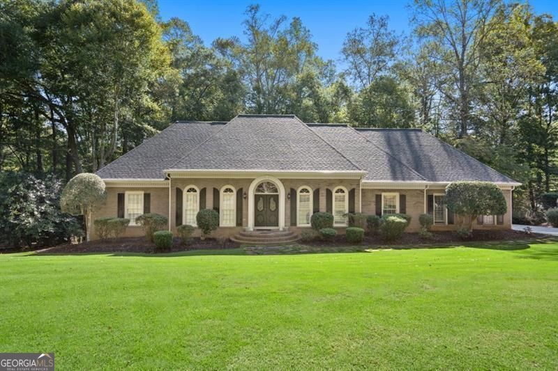 Come home to the luxury lifestyle of single-level living! This all-brick home affords a gracious two-story, cathedral ceiling, Great room; an all white, remodeled chef's kitchen with granite island and counter tops & new 5-burner gas cook top, and huge Primary bedroom and spa bath, all conveniently located on the main level. You are welcomed by gleaming hardwood floors in the Living, Dining, and Great Rooms, and stunning millwork in these beautiful rooms. With a new roof, gutters, HVAC systems, hot water heater, and refinished and new hardwoods, new grass in front,and landscaping in the back yard, this home is a maintenance-free, luxurious home just waiting for the new owners! Additional two bedrooms for family, guests, or game rooms are upstairs, and of course the basement is fully finished and ready for your personal design. Come see this home, and experience the ease this plan affords you!