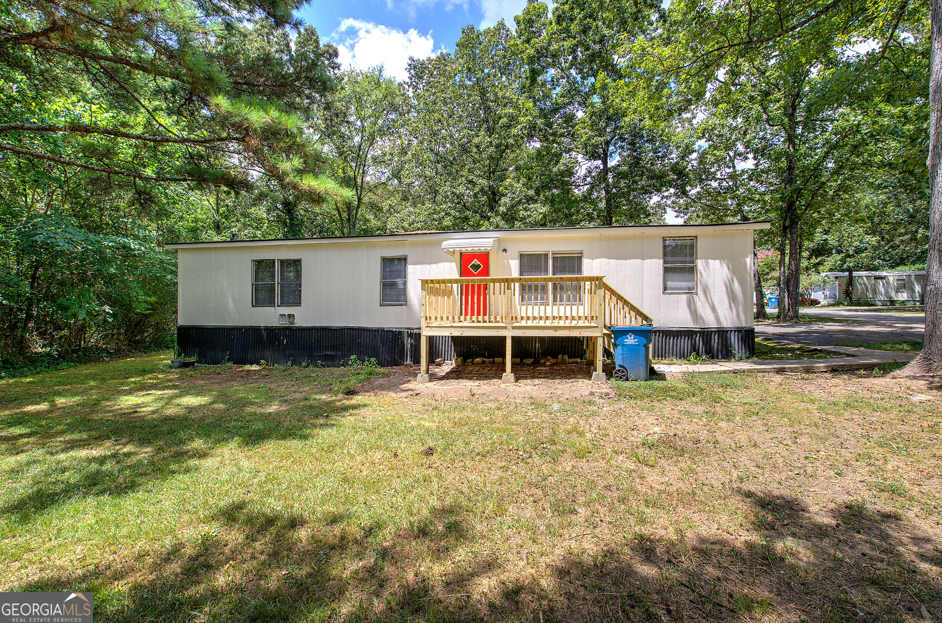 Welcome to this beautifully remodeled modular home in Swan Lake Mobile Home Park. This home features a brand new deck and new exterior paint. Step inside to this mostly open concert home. Brand new LVT flooring throughout. Freshly painted cabinets. All kitchen appliances come with the home. Step up to your spacious dining area. Livingroom has a wood burning fireplace!! Spacious primary suite with walk in closet. Primary en-suite features a new stand-up shower, new vanity, new toilet. 2 secondary rooms are nice and spacious. the guest bathroom was fully remodeled! New light fixtures throughout the home. Don't let this home slip away! Home can be financed through Vanderbilt Mortgage and Finance. All buyers must pass a background check through Swan Lake Mobile Home Park.