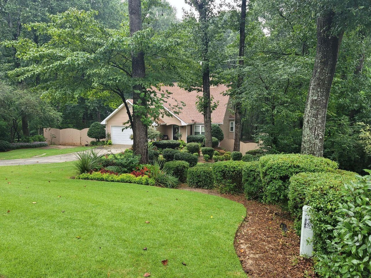 Wont Last! MOVE IN READY! Home in a quiet neighborhood. Highly sought after Grayson High School district. Large master bedroom is on the main level. Eat-in kitchen with granite countertops, Hardwood Floors and Stainless Steel Appliances. A large backyard which is surrounded by trees and backs up to a running creek. Feels like your own private oasis. Large enclosed Sunroom with Extra Large Windows and hardwood floors allows you to enjoy the scenery surrounding the home year round. No HOA Fees!