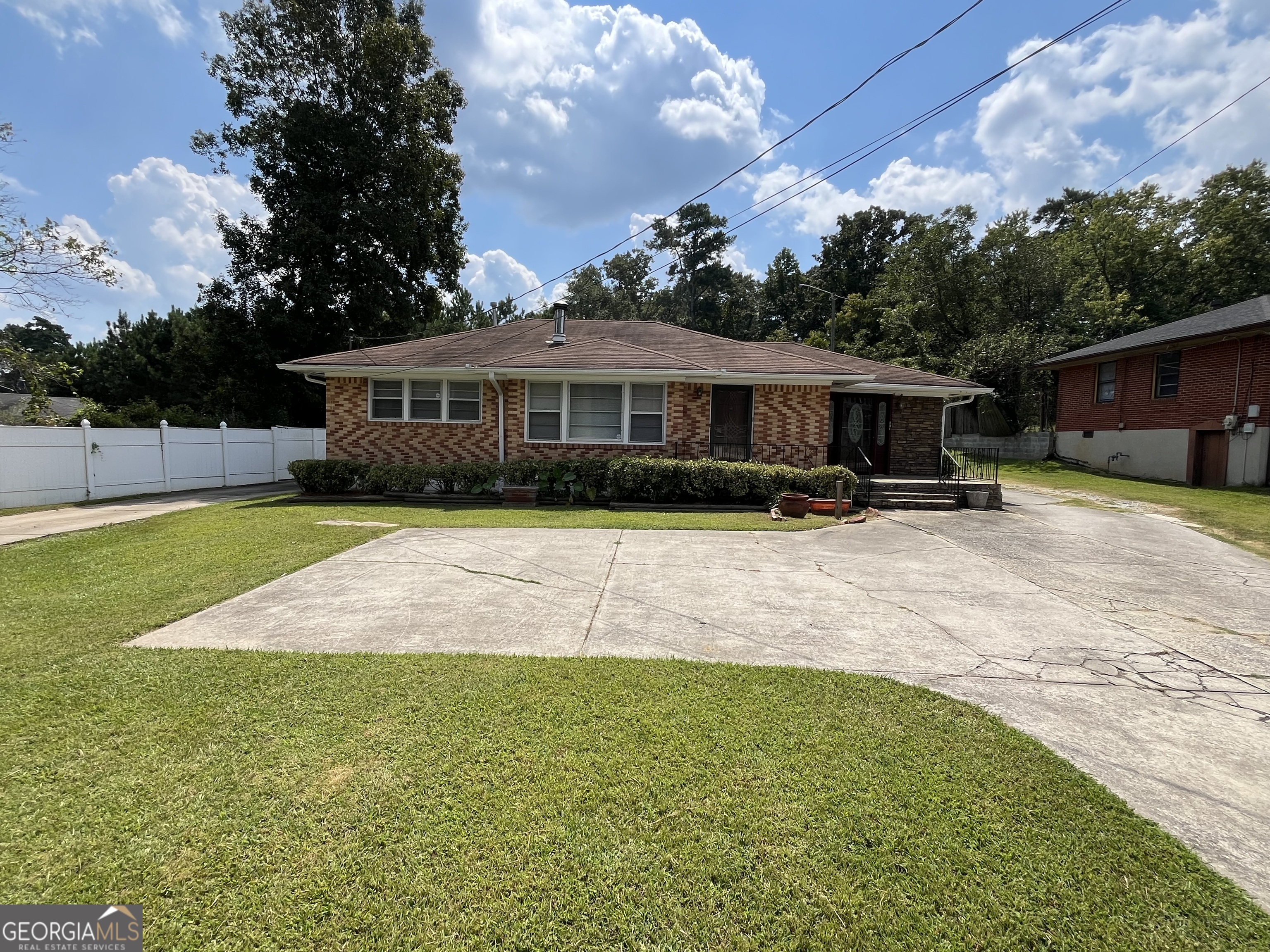 This move-in ready 3-bedroom, 2.5-bath home offers plenty of space and convenience. Inside, you'll enjoy a bright sunroom, perfect for relaxing or entertaining year-round. The home comes complete with a washer and dryer, an ADT security system, and a tankless water heater for added comfort and efficiency. The property also features a detached double-car garage and an oval driveway, providing ample parking and storage options. With its spacious layout, this home is designed for comfortable everyday living. Schedule your showing today and make this Forest Park home yours!