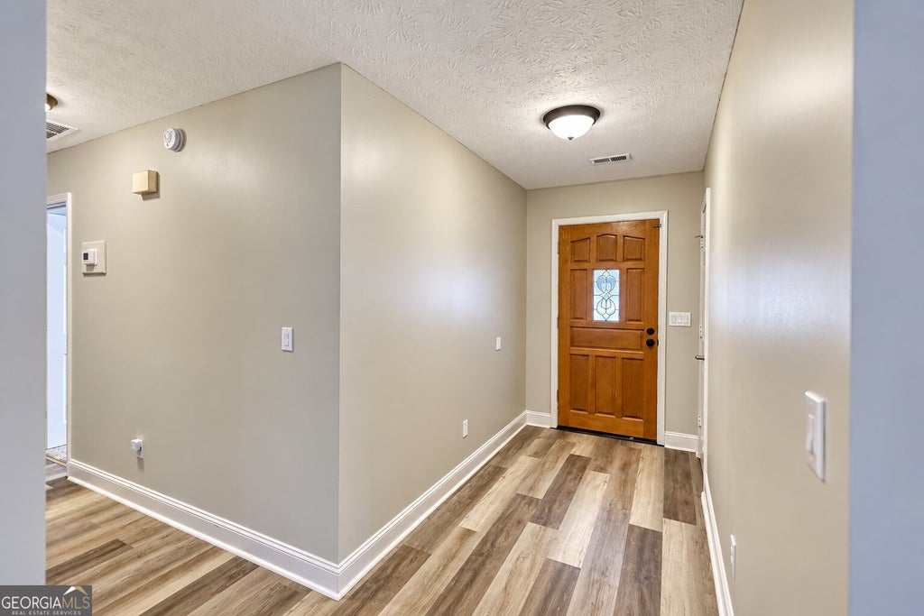 Photo of 4302 Derbyshire Trace SE, Conyers, GA 30094 (MLS # 10866948)