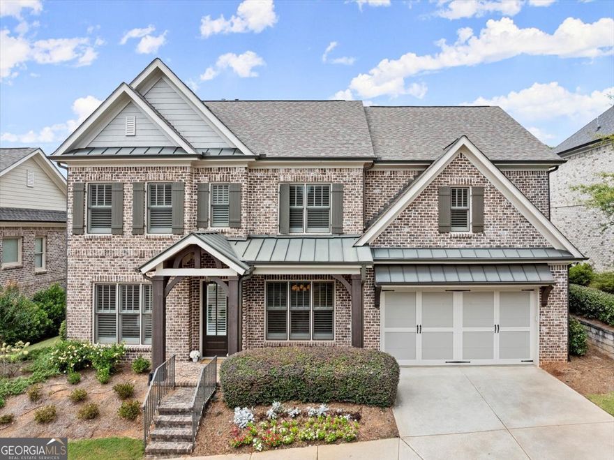 Hurry in to this stunning, custom-built, 4-sided Brick home in a gated enclave in sought after Sandy Springs, close to Chastain Park and fantastic restaurants and shopping!  The inviting curb appeal is just the beginning.  From the moment you step into the welcoming entry, you will love the high-end finishes and attention to detail.  Work from home?  The  formal Living Room/Study off the foyer makes an ideal Home Office with its rich wood coffered ceiling, natural light, ample room for files and storage, and French doors for privacy.   The foyer leads to a spacious fireside Great Room with Built-in Cabinets and Bookshelves, high Coffered Ceilings and an enormous Open Cook's Kitchen with Double Ovens, a large Center Island, gorgeous designer Backsplash, a Gas Cooktop and an impressive custom Vent Hood.  You'll enjoy cooking and entertaining in this gorgeous Open Plan, as the Kitchen flows to the Dining Room with its elegant Wainscoting and room for large Dinner Parties.  Relax and unwind in the Sunroom with year-round comfort and views onto the private, fully fenced backyard.  There's more room to relax and play upstairs in the large Rec Room/Media Room, offering getaway spaces on every level!  The Primary Suite is spacious and serene with a tray ceiling and Spa-Like bath, including a separate soaker tub and shower, herringbone floor tile, dual vanities and a large custom-closet for easy organization.  Secondary bedrooms are comfortable and bright and offer flex space for a home gym or extra office.  A convenient bedroom on main makes it easy to host family or guests of any age.  The Enclave at Mount Paran is a quiet, friendly community, tucked behind gated security in a private cluster of 11 unique homes, where the HOA takes care of your lawn giving you more time to enjoy life!  One of the larger homes in the community, this property is situated on the side of the street adjacent to other multi-million dollar neighborhoods and enjoys a larger back yard with privacy landscaping... perfect for pets or outdoor play.  Ideally located inside the perimeter, just north of Chastain Park, and just minutes from I-285/75/GA400, convenient to Buckhead, the Sandy Springs Performing Arts Center, Top Restaurants/Shops, and easy access to just about anywhere!  Don't miss it!