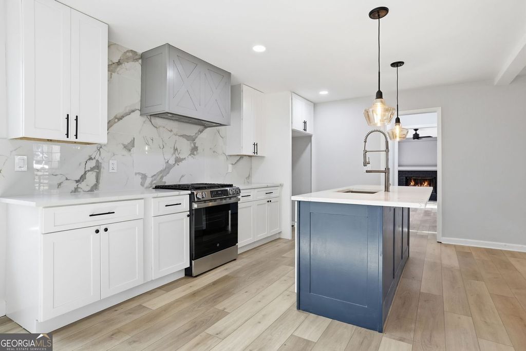 Photo of 5147 Rocky Run Drive, Stone Mountain, GA 30088 (MLS # 10673713)