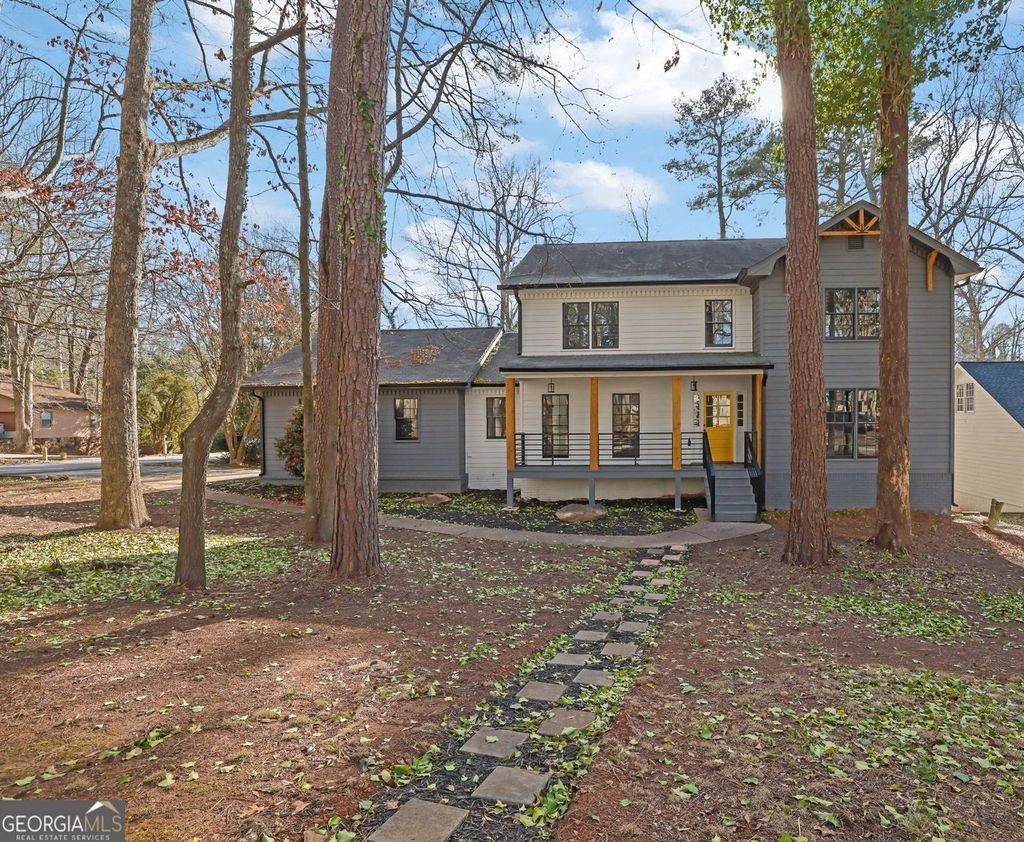 Photo of 5147 Rocky Run Drive, Stone Mountain, GA 30088 (MLS # 10673713)