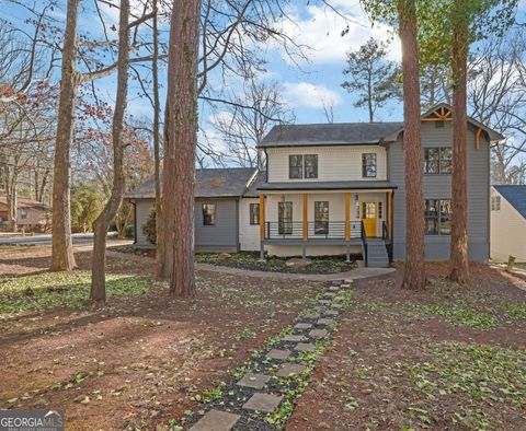 Photo of 5147 Rocky Run Drive, Stone Mountain, GA 30088 (MLS # 10673713)