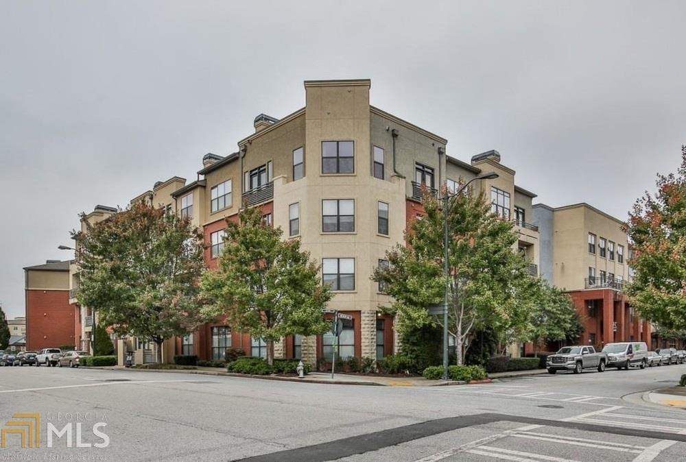 Desirable Atlantic Station location! Condo features open floor plan, crown molding, & plenty of natural light throughout. Kitchen boasts tile floors, modern light fixtures, & breakfast bar. Refrigerator & HVAC replaced in 2017. Living/family room combo w/ceiling fan. Roommate style bedrooms, connecting to master bath. Spa like master bath features, spacious double vanity, an abundance of cabinets for storage, & shower/tab combination. Amenities include gym, pool, & area for grilling. Moments away from shopping, movie theater & restaurants. Special financing available!