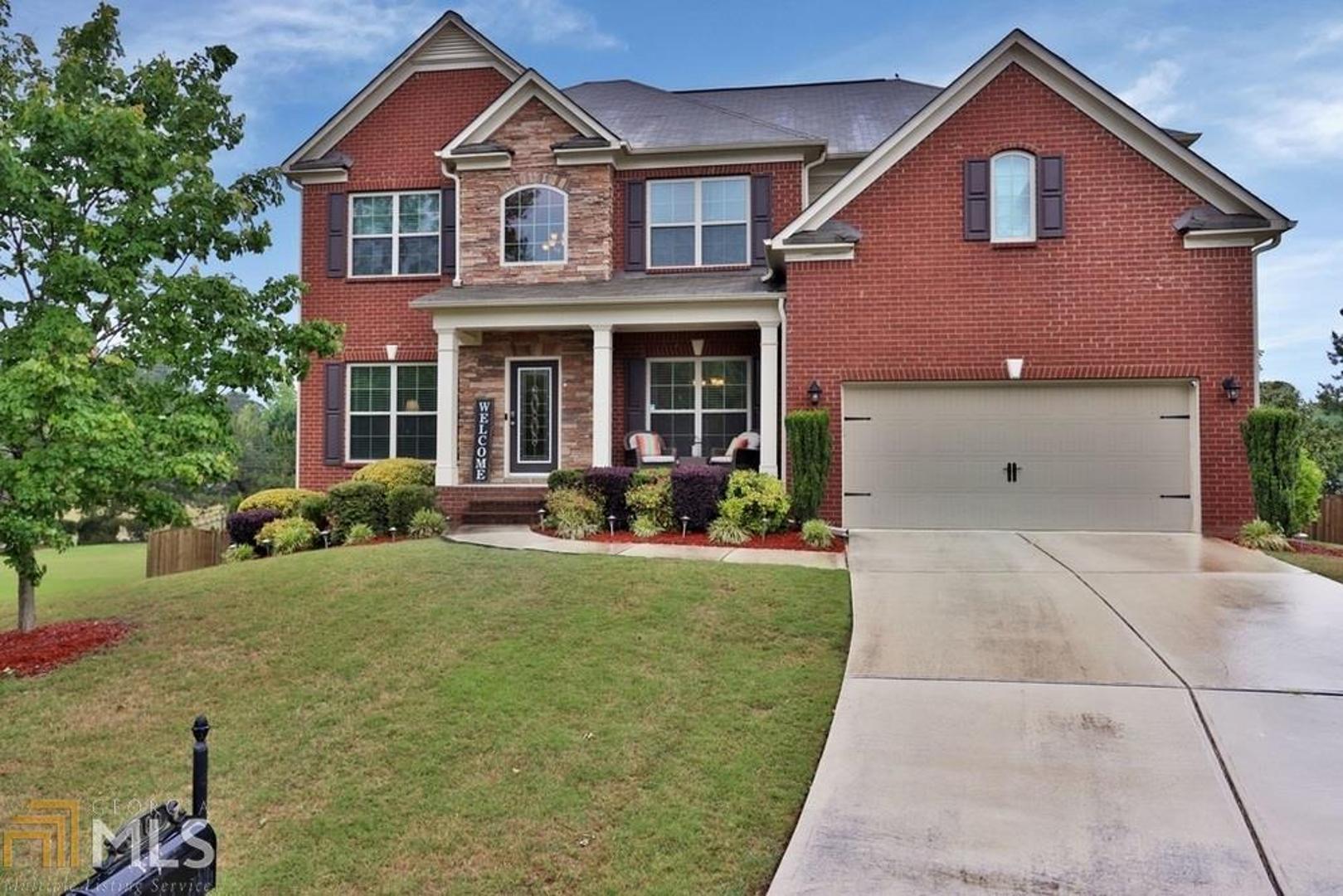 Beautifully maintained home tucked away on cul-de-sac lot in sought after Hamilton Manor neighborhood. Located in one of Gwinnett Co's highest rated school districts, this property has it all. Enjoy the spacious layout on the main level, 2-story foyer, full guest bedroom & bath, kitchen with center island, living room with access to back deck. Upstairs you'll find three secondary bedrooms, and an oversized master complete with sitting room, tray ceilings, and huge master bath. An entertainers dream, full finished basement with bedroom and full bath, media room, kitchenette, and opens to the backyard. Arguably the best lot in the neighborhood, level fenced, and even has a basketball court! Home conveniently located minutes from local restaurants, shopping, grocery, & I-85.
