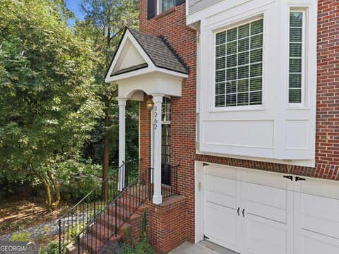 Photo of 1262 Brickton Drive NW, Atlanta, GA 30318 (MLS # 10826758)
