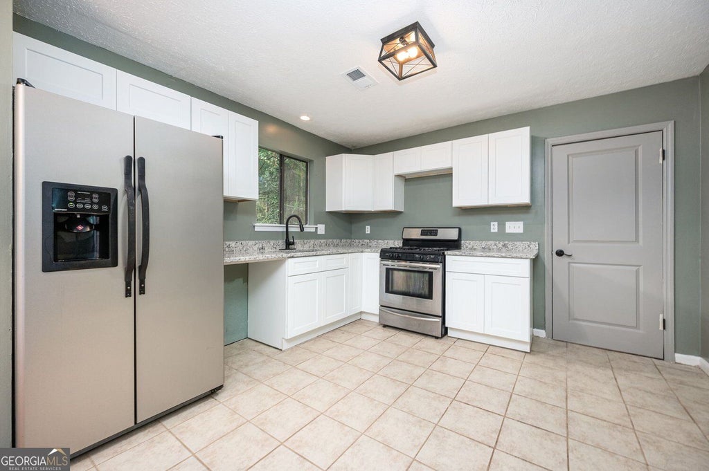 Photo of 1650 Auden Lane NW, Norcross, GA 30093 (MLS # 10853814)